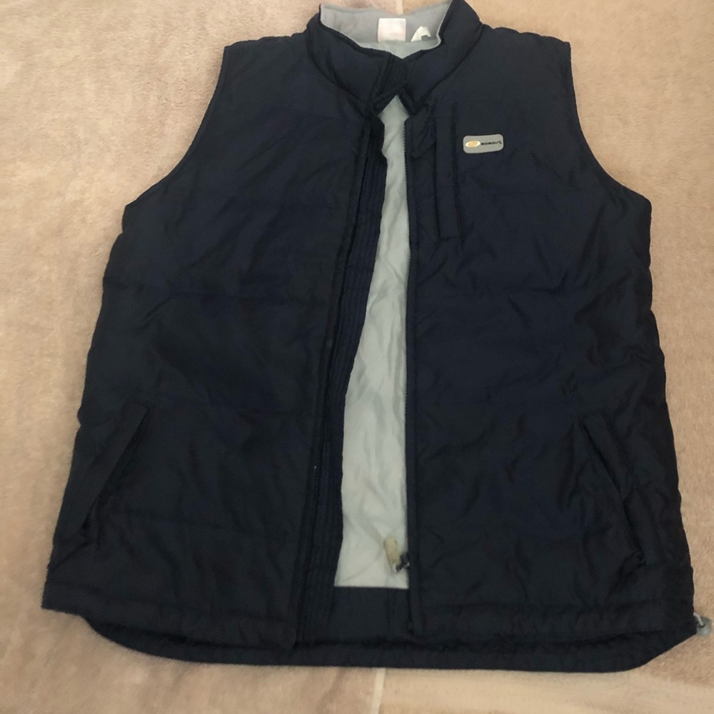Sideout vest is dark blue with gray